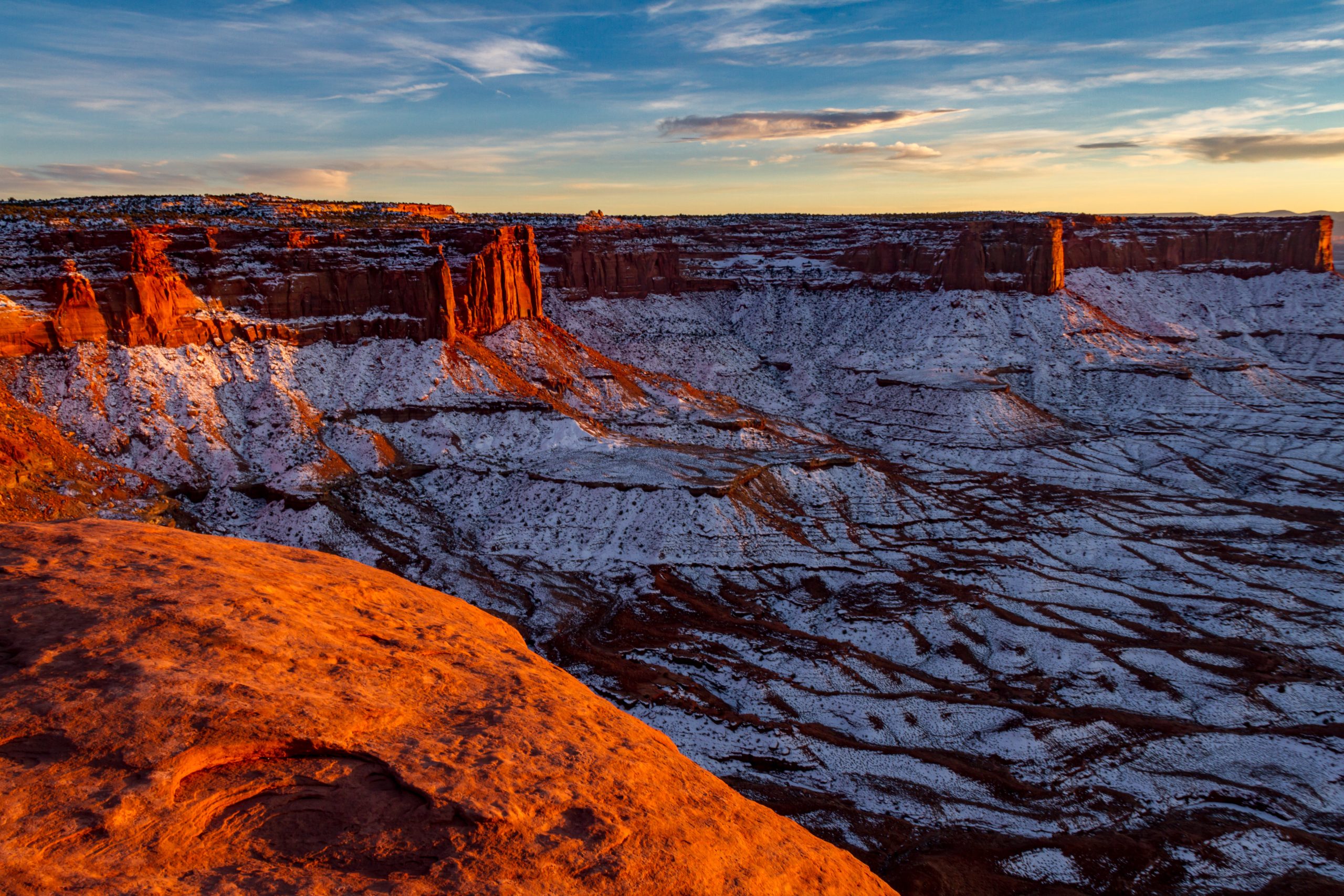 A landscape image of Moab, Utah, covered in snow.