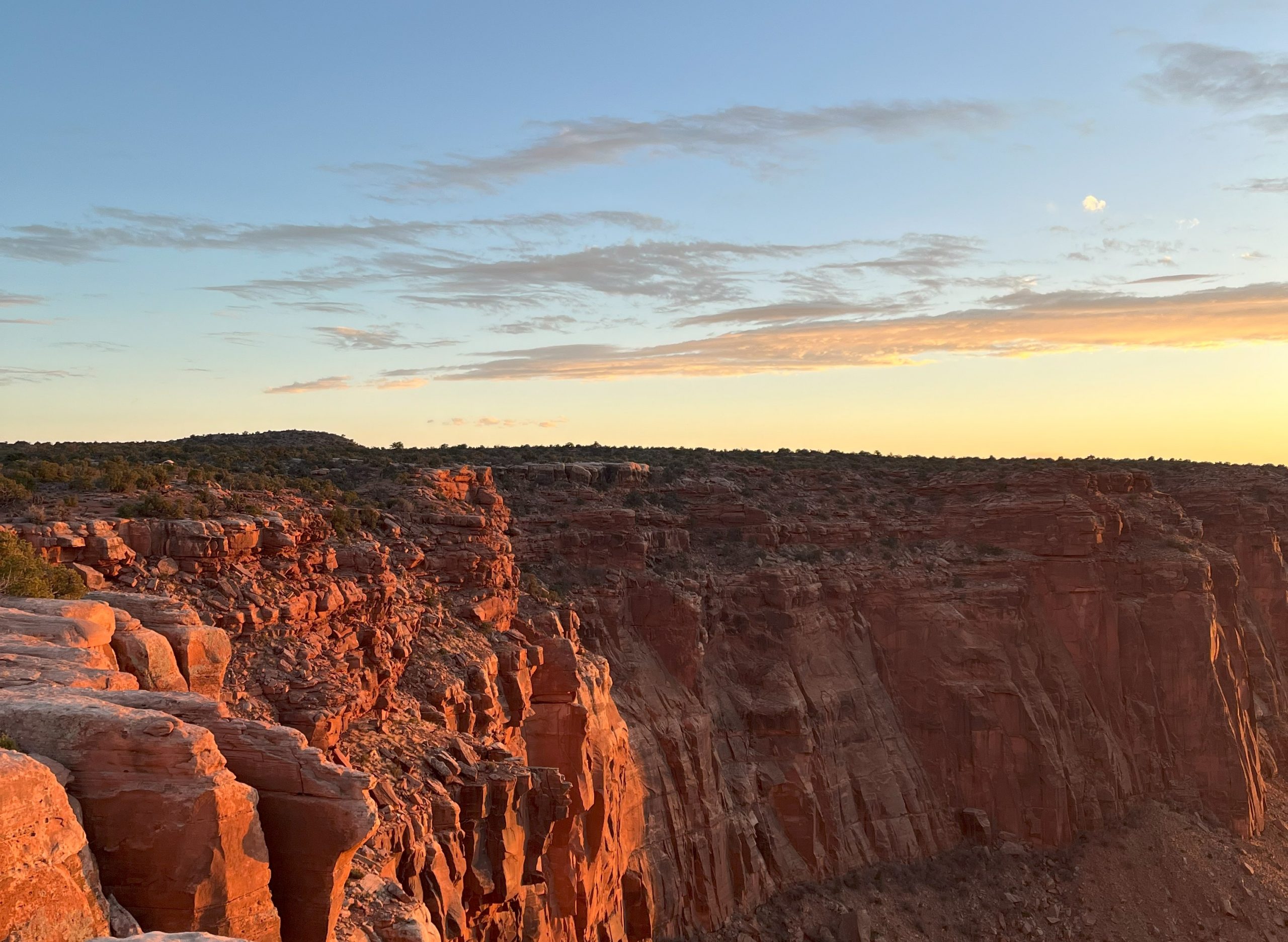 A canyon wall at sunset.